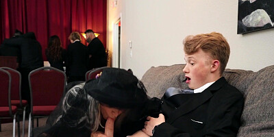 Mature Sally D'Angelo with fake tits and sex at a funeral