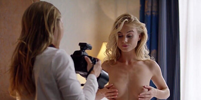 Attractive blonde prepping for a lesbian fuck session