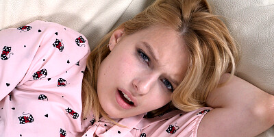 Gorgeous amateur blonde is masturbating on the couch