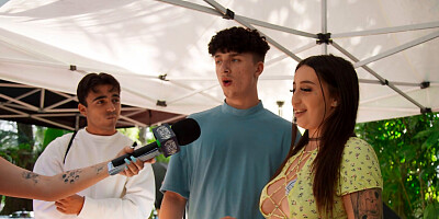 Slutty blonde sucks a massive cock in front of an audience