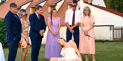 A man in a dog mask is fucking the bride while outside