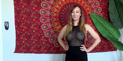 Busty redhead Dani Jensen wearing a seethrough shirt