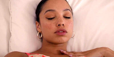 Alexis Tae and Whitney Wright on a white coloured sofa in several lesbian scenes