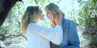 Two Blonde Divas Indulge In A Lesbian Session During Their Walk In The Woods