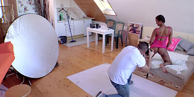 Ebony babe Carol Marf rides photographer's cock