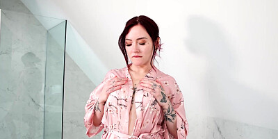 Sexy redhead Eva Ray sucking dick in the bathroom