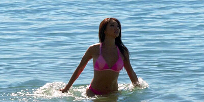 Busty Asian Ayumi Anime solo fucks herself on the beach