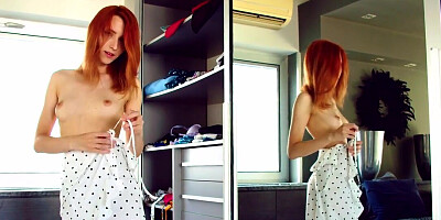 Redheaded girl in slutty lingerie shows her fingering skills