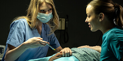 A couple of sexy chicks have a threesome with a patient