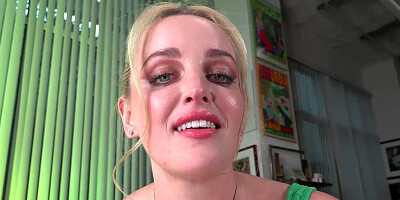 Blonde girl with a pretty face orgasming on camerae