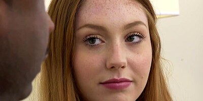 Red haired slut is sucking a stiff, black dick and getting it inside her wet pussy