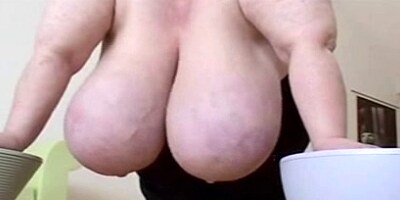 Mature with huge tits lets a younger boy have fun