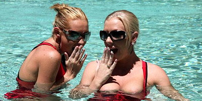 Sweet blonde with silicone tits Brit is jumping on a pretty huge dick