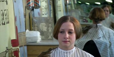 Swimming team girls shave their heads