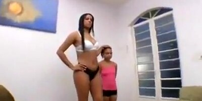 Deep tongue kiss small and tall girl