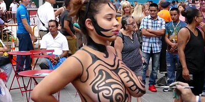 Big tits girl public body painting