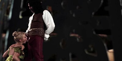 A hot blonde with large tits is having her cunt fucked by a horny dude