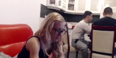 Wife plays behind husband and his friend