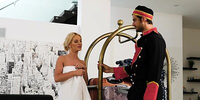 Bellhop fucks a beautiful blonde guest in her slick cunt