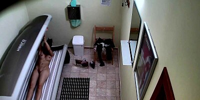 Shaved and Tight Pussy Caught in Solarium