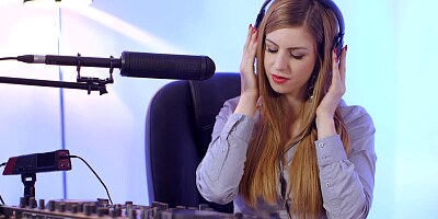 A busty milf is taking a dick in her mouth and in her wet pussy